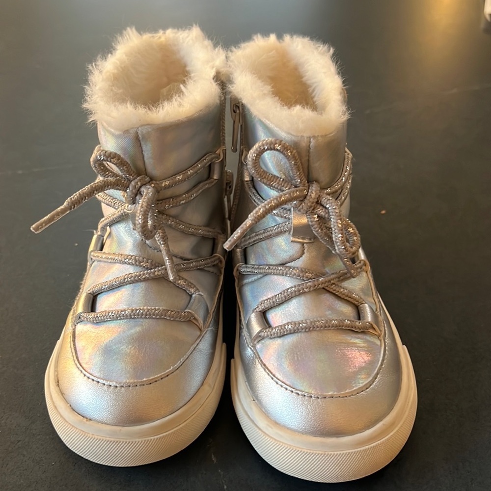 Iridescent silver snow boots